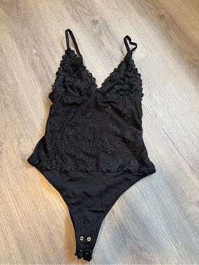Dynamite Black Lace Bodysuit with Snap Closure